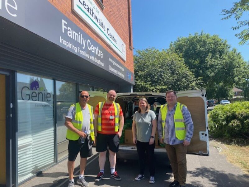 Andrew is pictured with Bob, Hannah and John - who all volunteer for Stretford Foodbank.