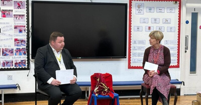 Andrew, at Seymour Park Community Primary, launching his children’s colouring-in competition during assembly. 